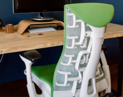Picture of a computer desk and chair to show you don't need a lot. To create a video tutorial or Digital Products